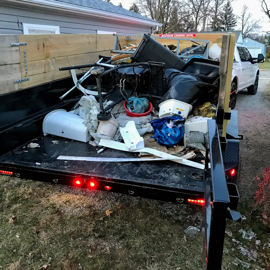 Roll-off dumpster delivered to a residential driveway in Gloucester